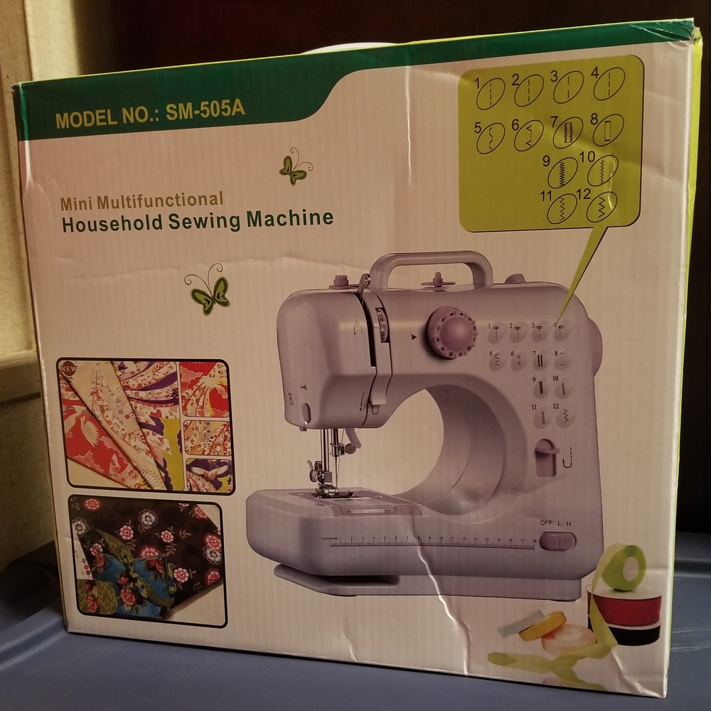 Compact Pink and White Sewing Machine - Picture 3 of 3
